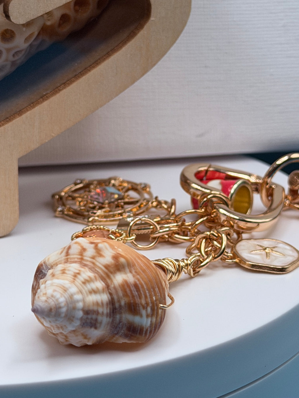 Conch Shell Compass Charm Cluster charm detail on shells