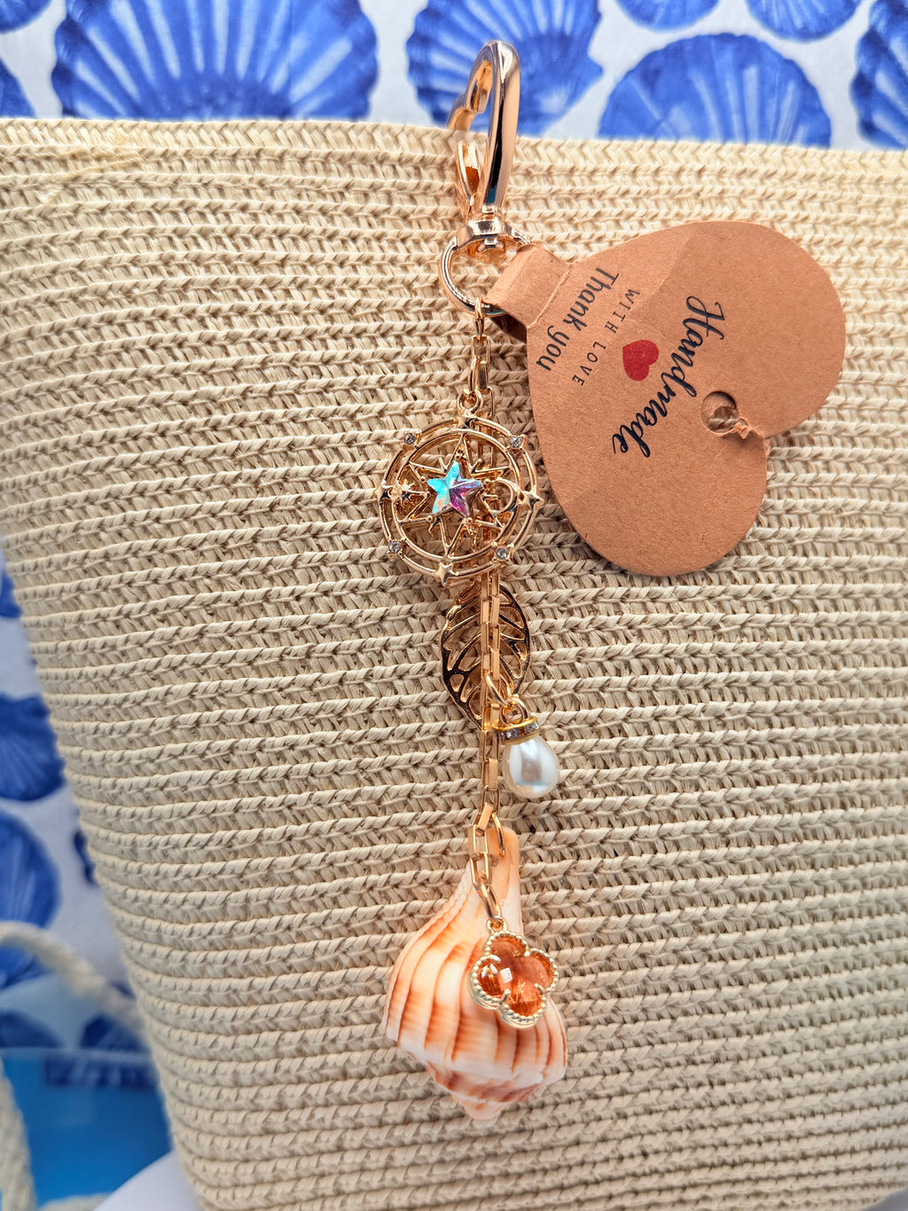 Celestial Shores Lightning Whelk Shell Bag Charm With Gold Compass Star Charm