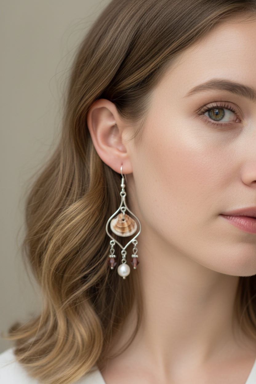 Calico scallop shell chandelier earrings on ruler showing 4 inch drop