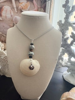 Jazzy Jingle -White Buttercup Shell Stacked Ceramic Dark Blue Bead Silver Cord Necklace