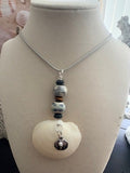 Jazzy Jingle -White Buttercup Shell Stacked Ceramic Dark Blue Bead Silver Cord Necklace