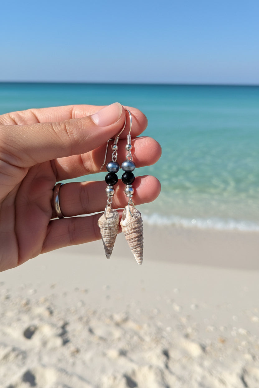 Auger shell earrings pair detail view