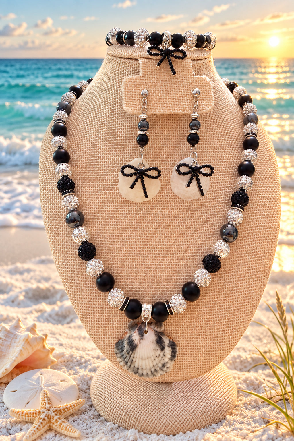 Black onyx shell pendant necklace and matching bow charm bracelet