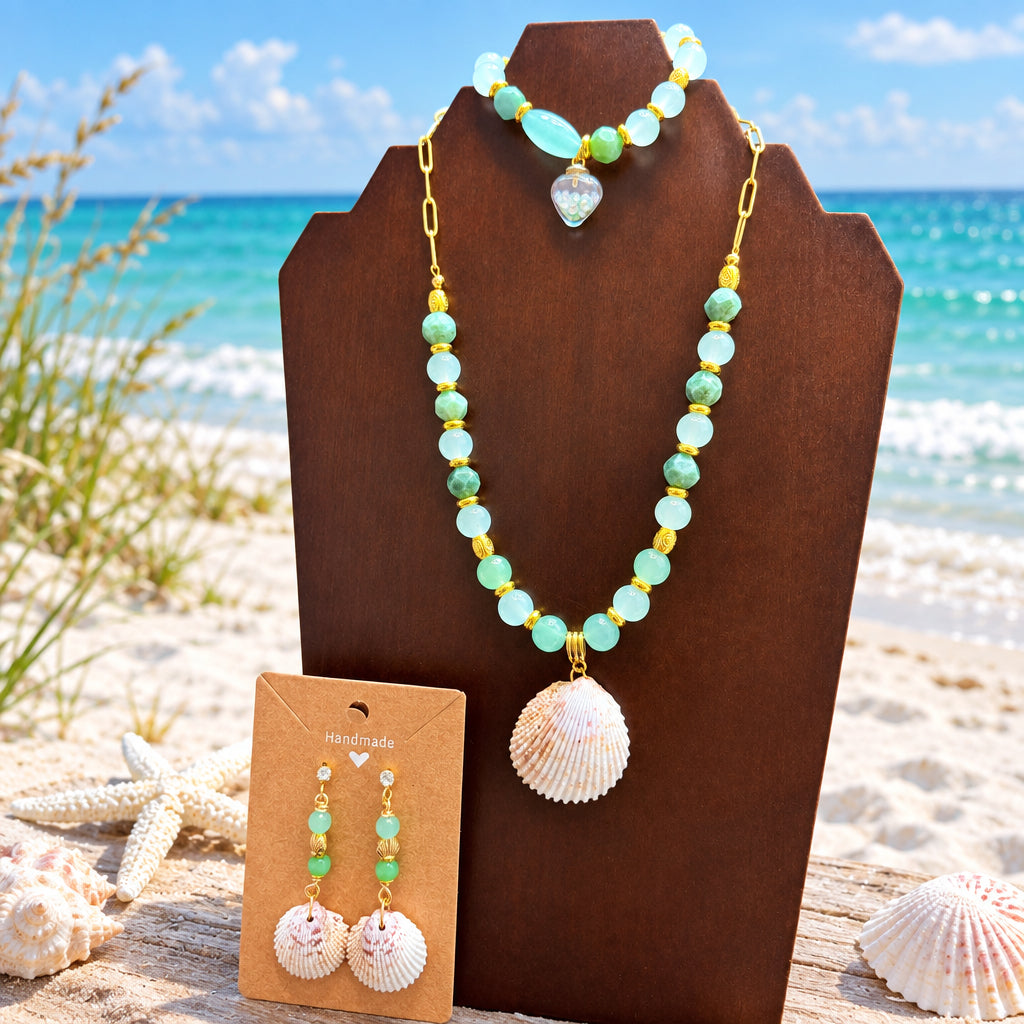 Matching green beaded shell necklace, bracelet, and shell earrings