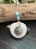 Whispers of the Shore – Buttercup Shell & Sand Dollar Pendant Necklace