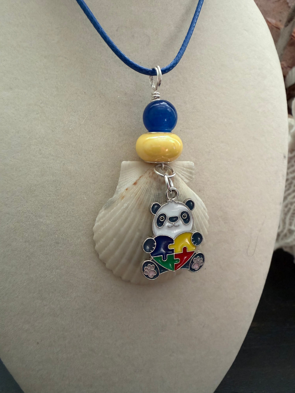Playful Pandy Autism Awareness Calico Scallop Shell Necklace