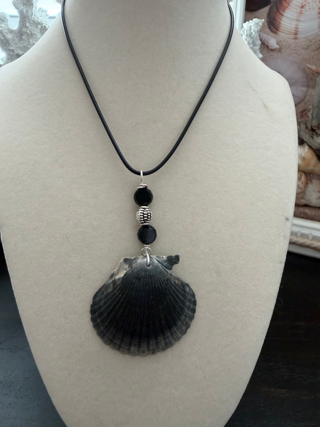 Dark Waters Scallop Shell Necklace – Crystal Wing Charm & Pavé on Black Cord
