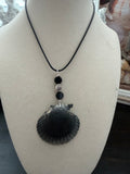 Dark Waters Scallop Shell Necklace – Crystal Wing Charm & Pavé on Black Cord