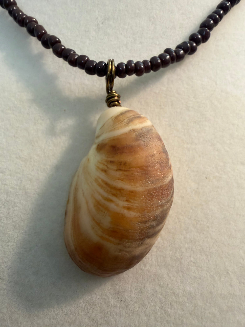 Driftwood Slipper Shell Necklace on Dark Garnet Bead Chain