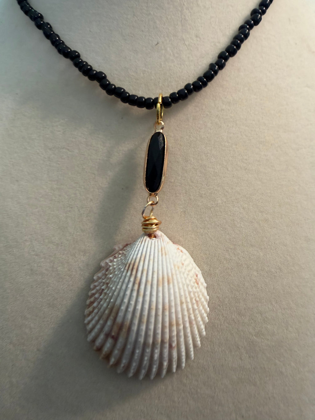Secret Shore – Dual-Sided Prickly Cockle Shell Necklace on Black Seed Bead Chain