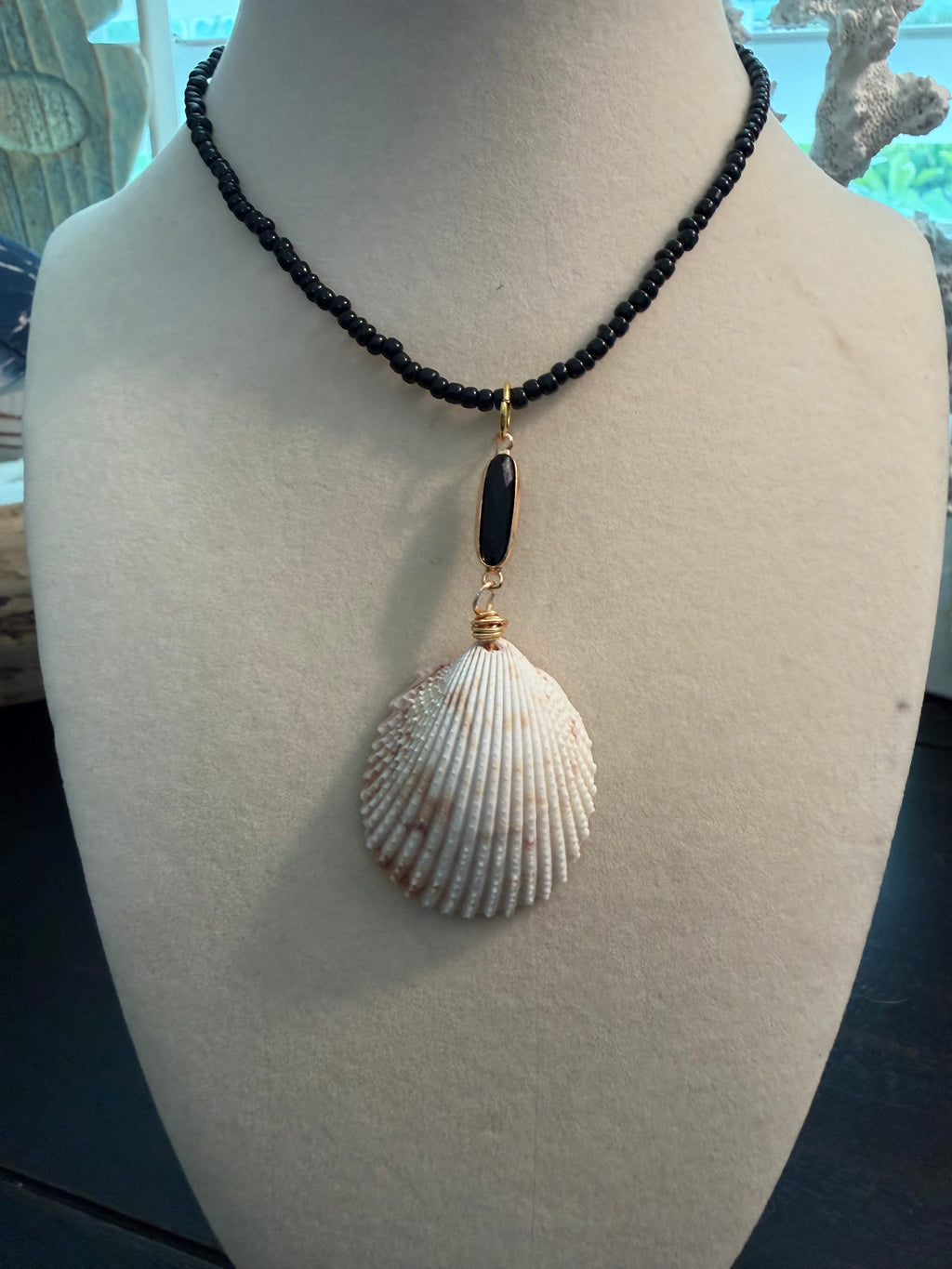 Secret Shore – Dual-Sided Prickly Cockle Shell Necklace on Black Seed Bead Chain