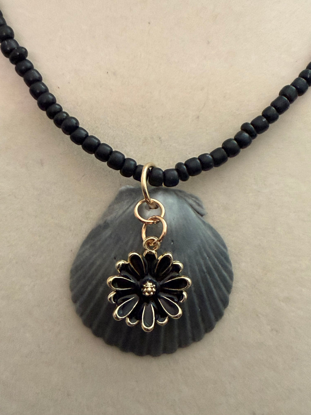 Midnight Daisy – Gray Calico Scallop Shell Necklace on Black Seed Bead Chain