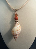 Tulip Drift – Banded Tulip Shell Necklace on Cream Braided Cord