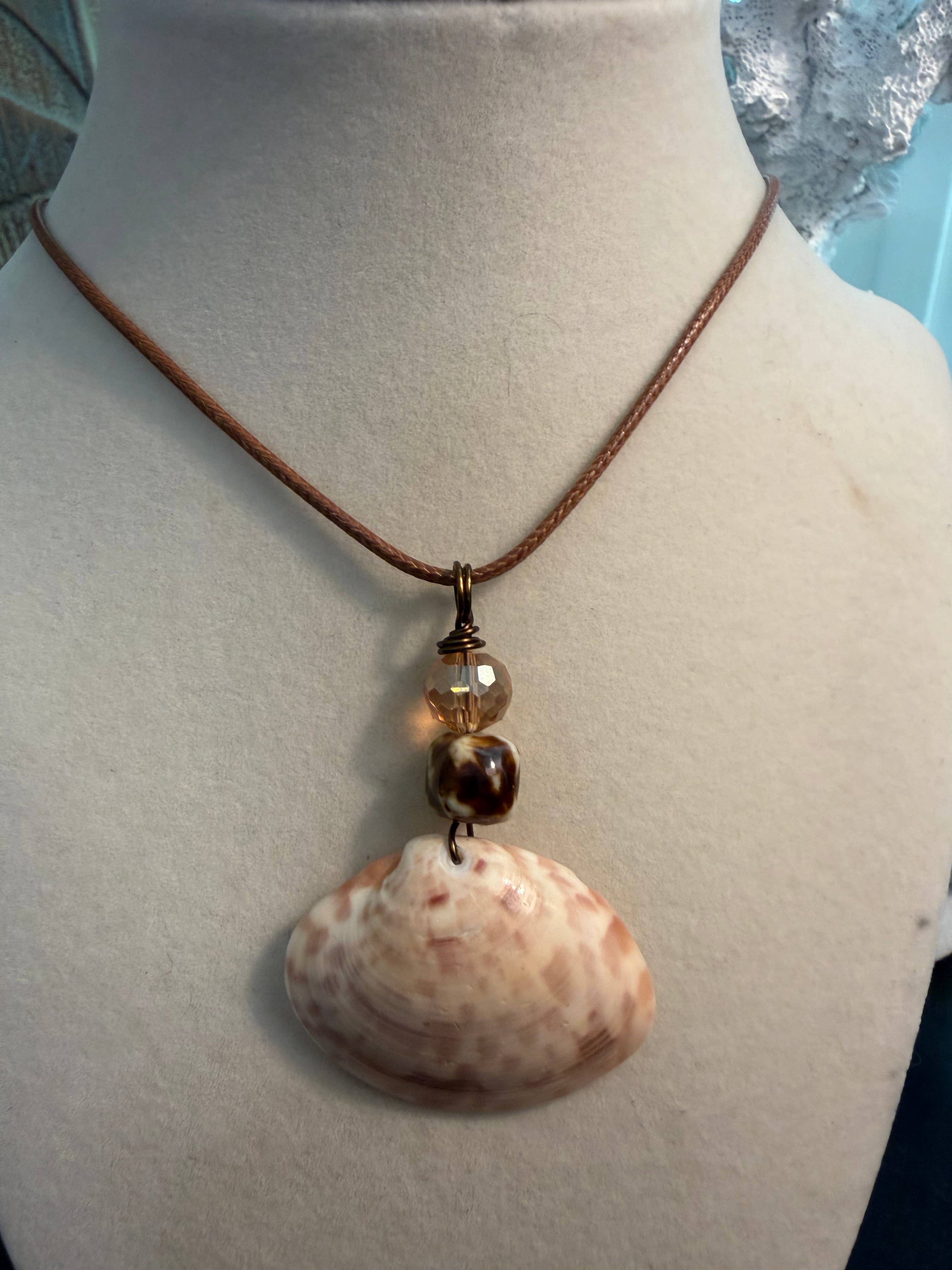 Clamstress Clam – Calico Clam Shell & Champagne Crystal Necklace on Brown Waxed Cord