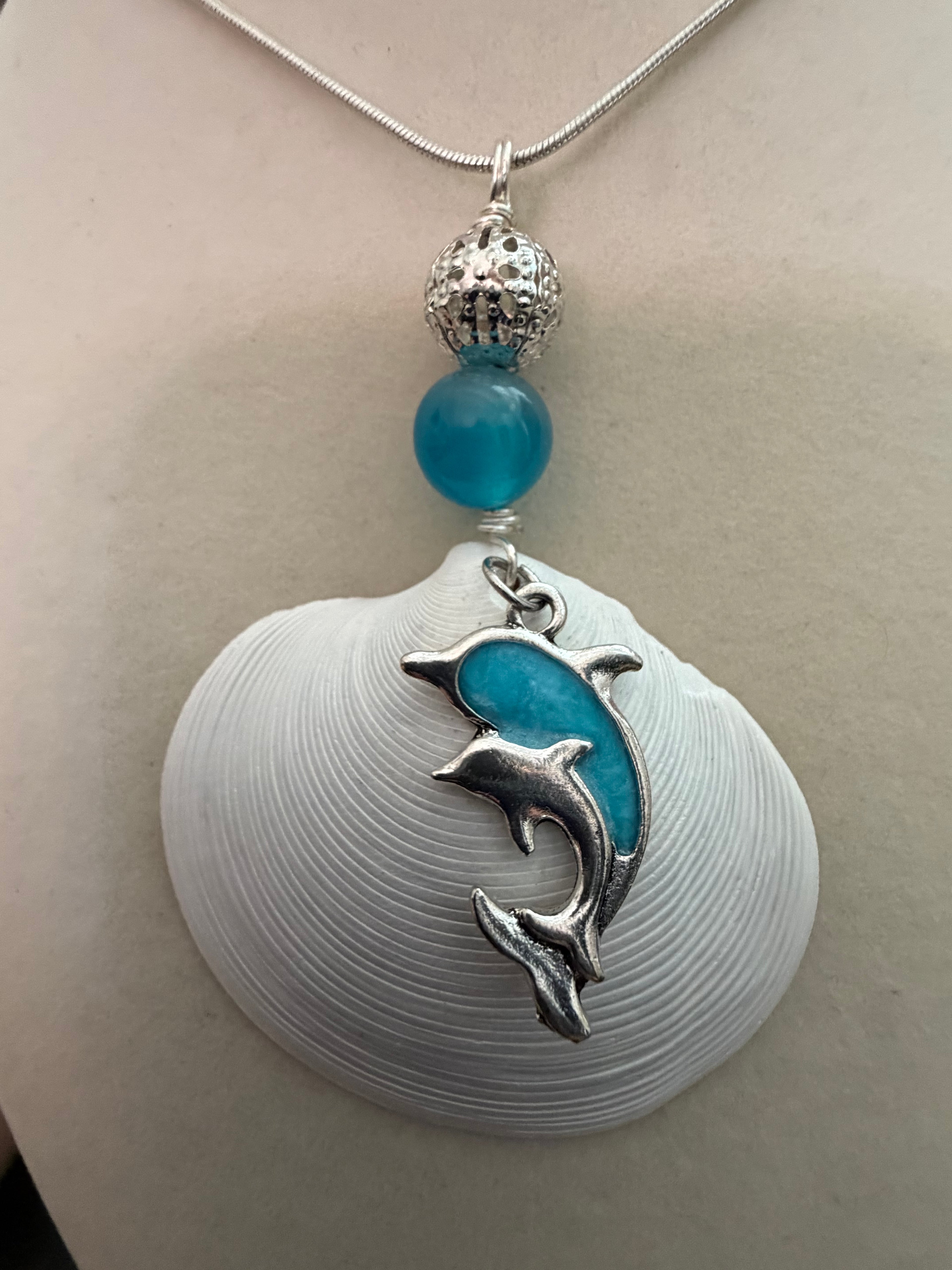 Dolphin Cove – White Disc Shell & Dolphin Charm Necklace on Silver Snake Chain