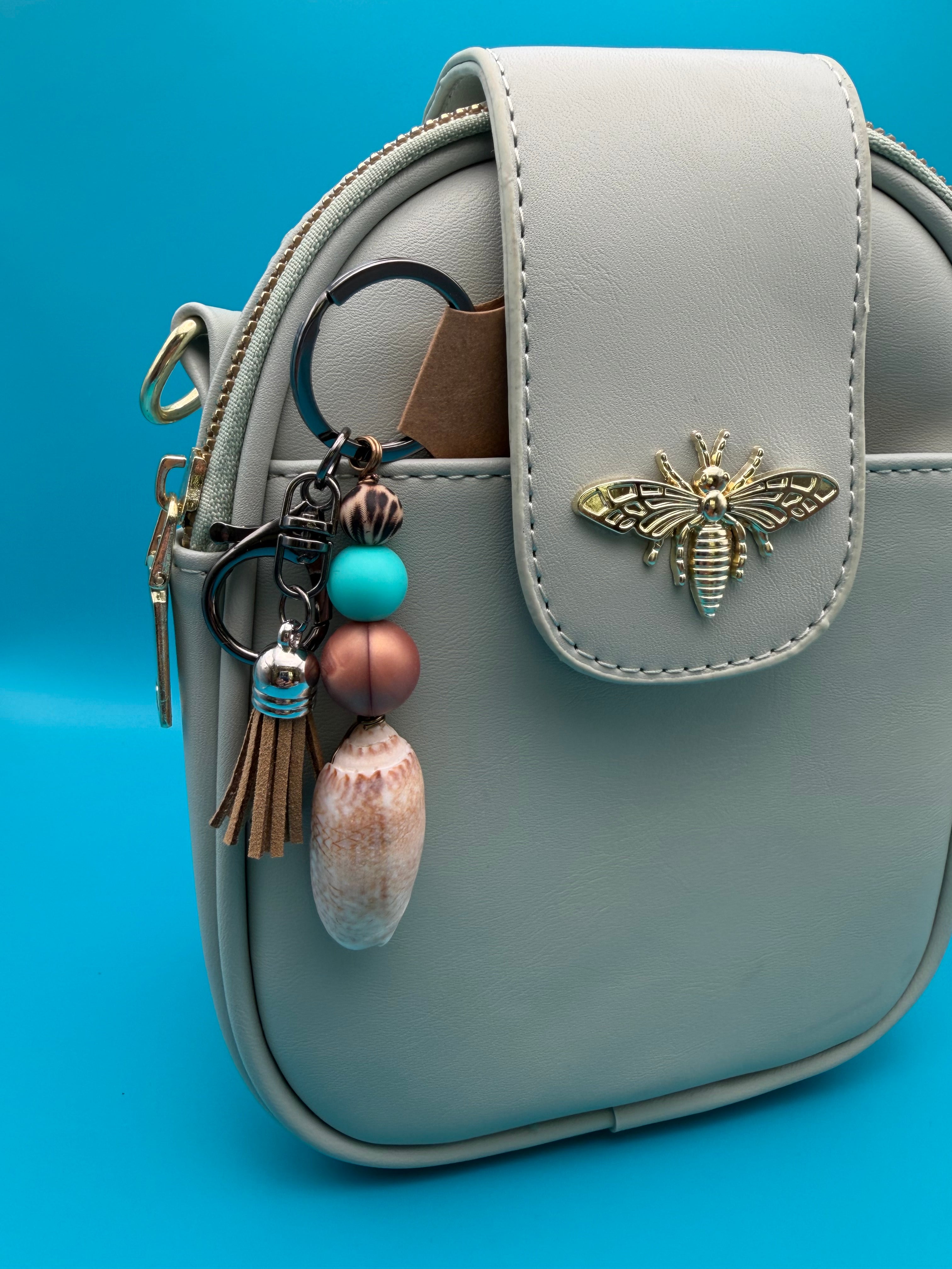 Sandy Tassel Olive Shell Keychain