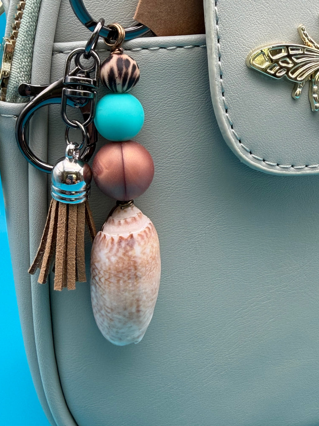 Sandy Tassel Olive Shell Keychain