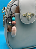 Sandy Tassel Olive Shell Keychain