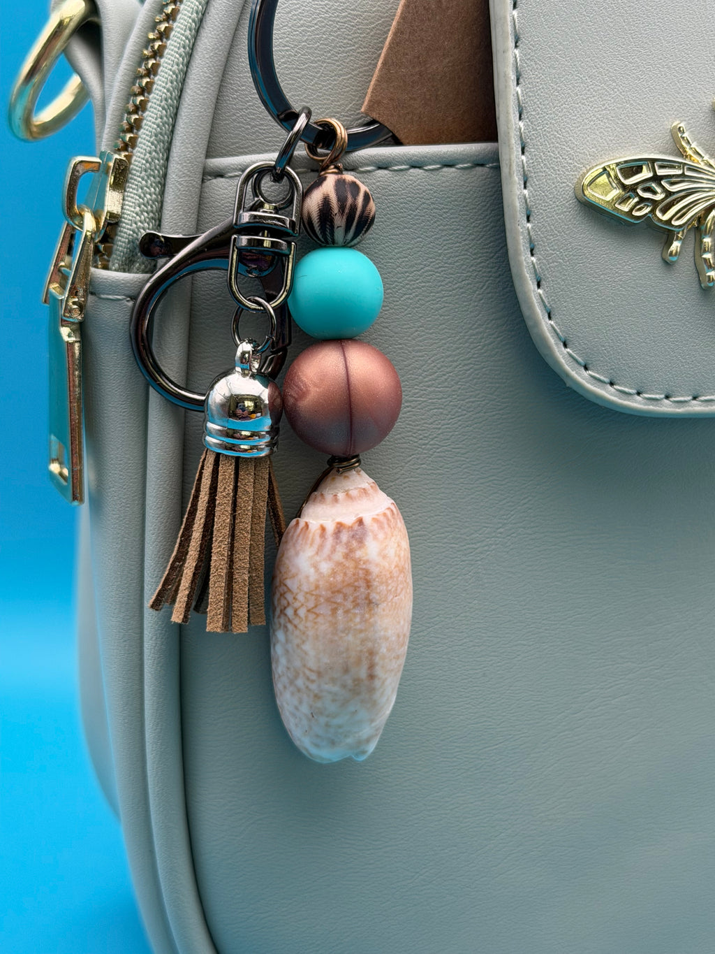 Sandy Tassel Olive Shell Keychain