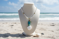 Coastal Necklace with Beach Background