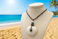 White Shell Necklace Close-Up with Beach - View 2